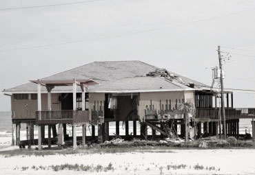 wind damage - spray foam can help prevent uplift to Fontana roofs